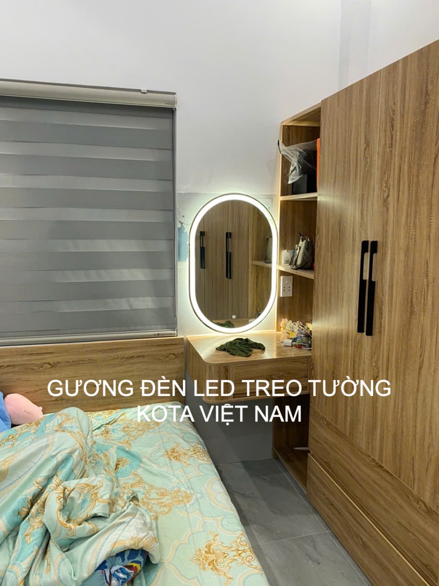 Cắt gương kính treo tường có gắn đèn led